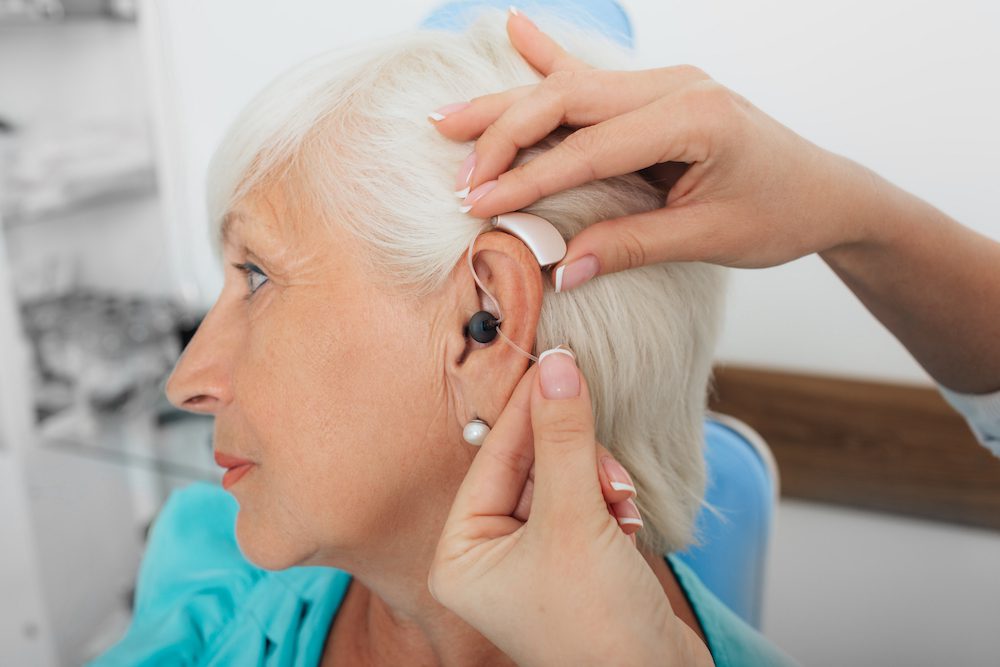 Person wearing hearing aids