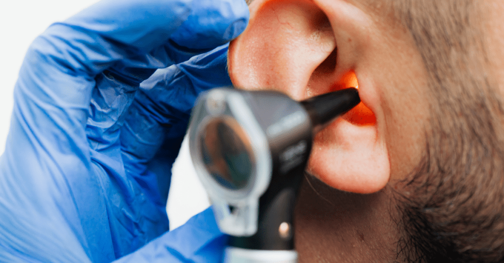 Patient getting an ear exam