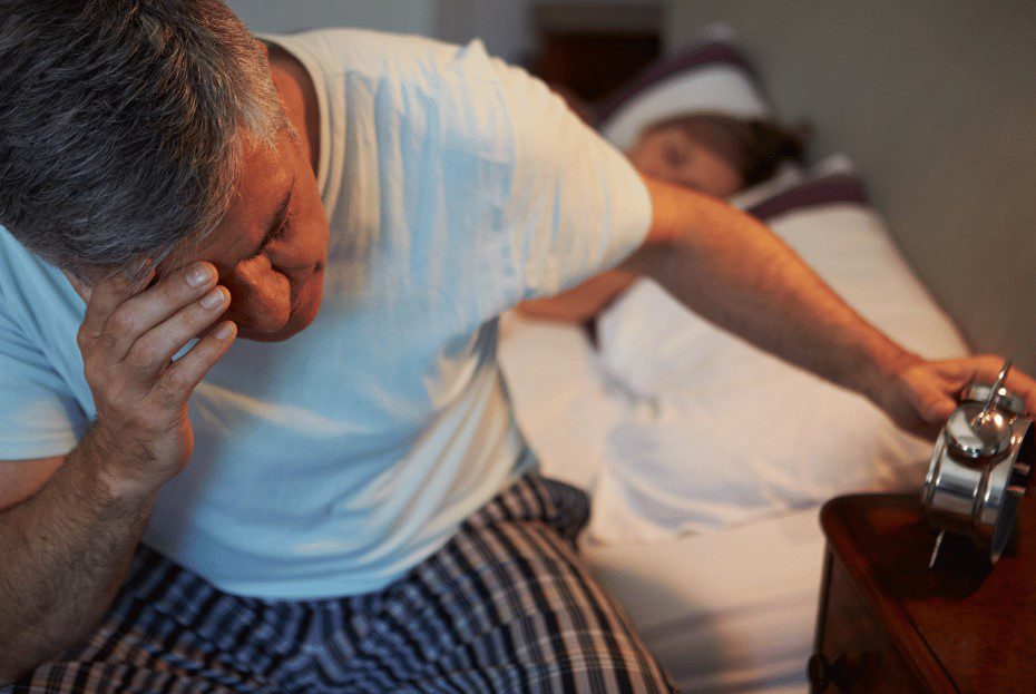 man getting out of bed