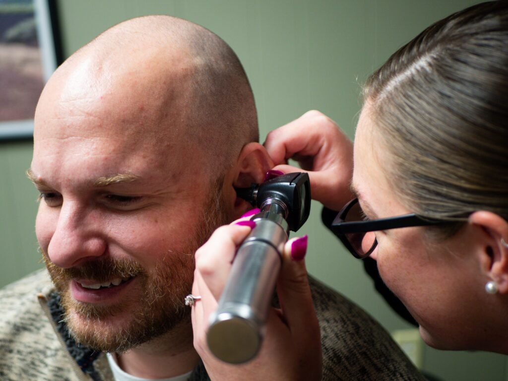 Man getting an audiological exam