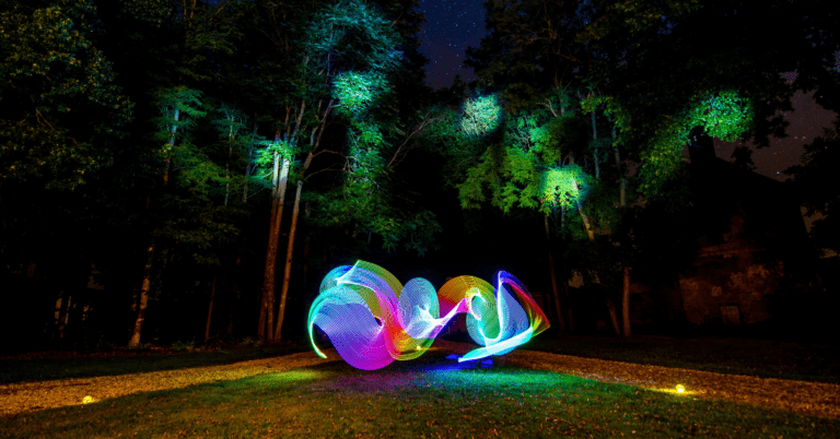 Nature background with rainbow swirls in the center