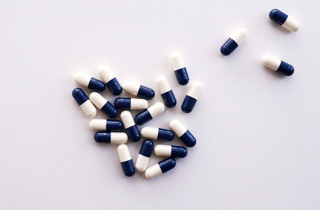 Loose pills on a white surface 