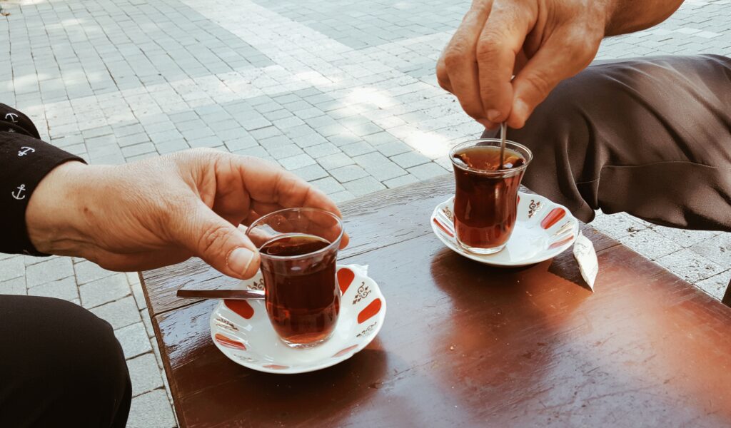 Two people drinking tea