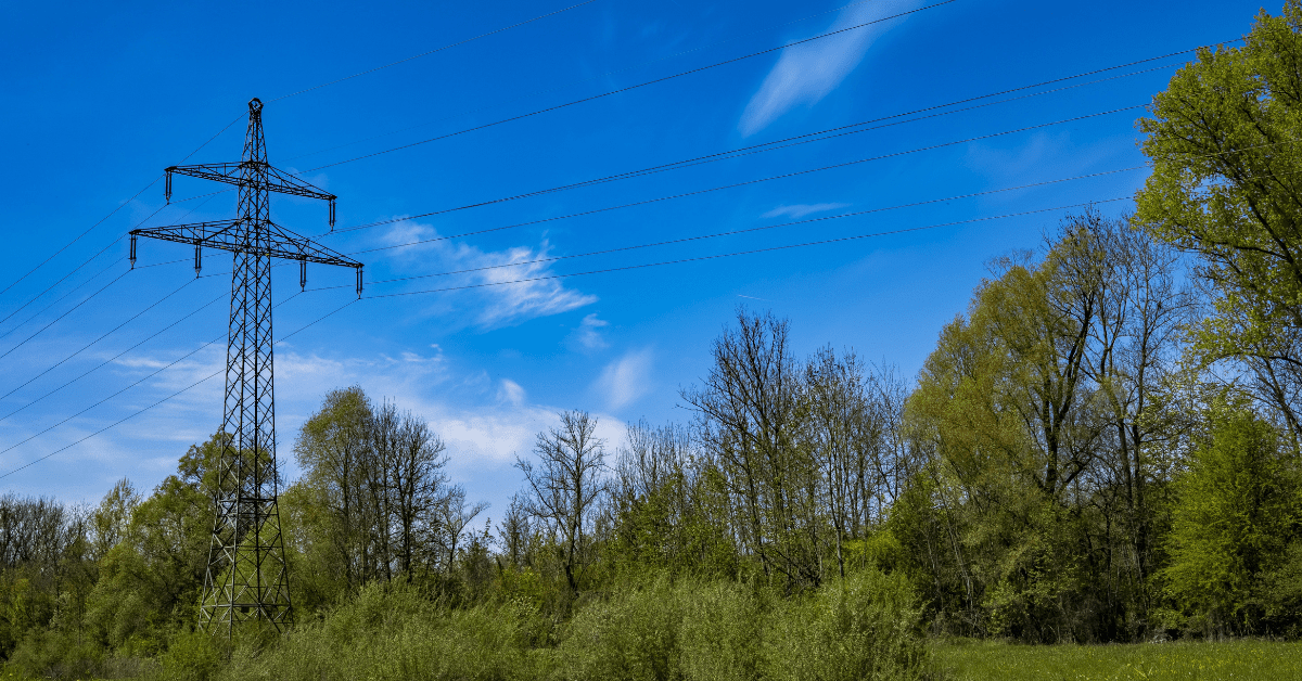 Power lines going across a field