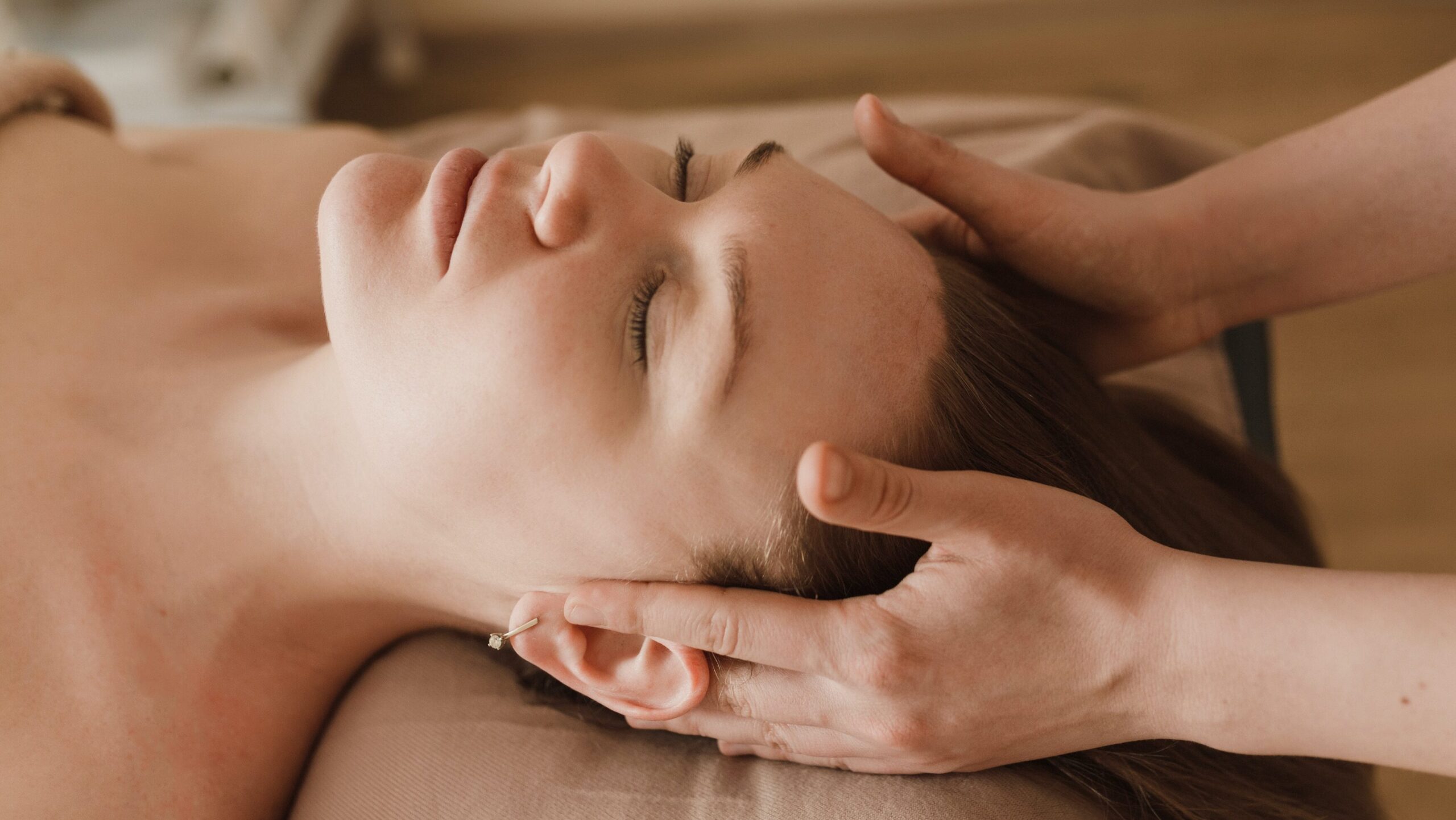 Woman in a reflexology session