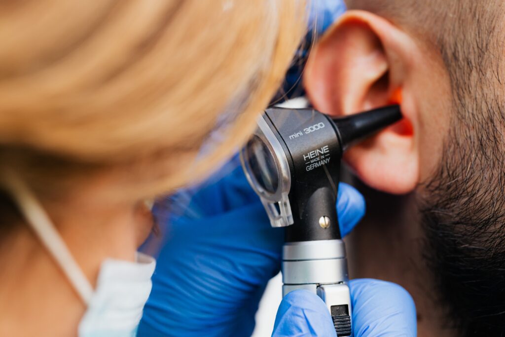 Person getting an ear exam 