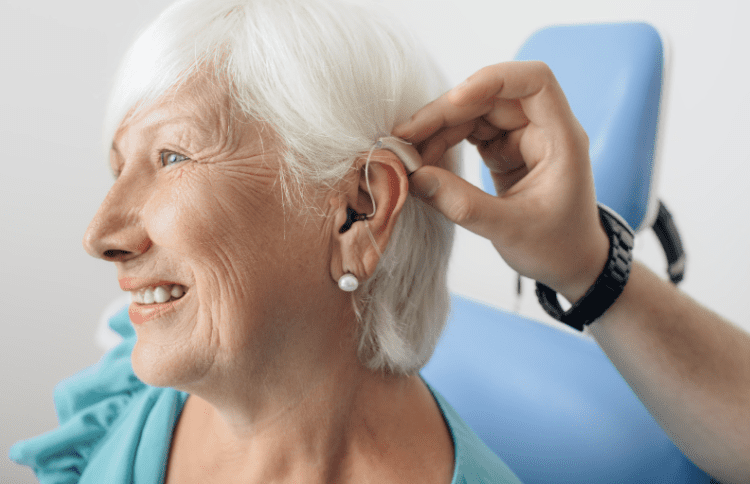 Older woman wearing hearing aids