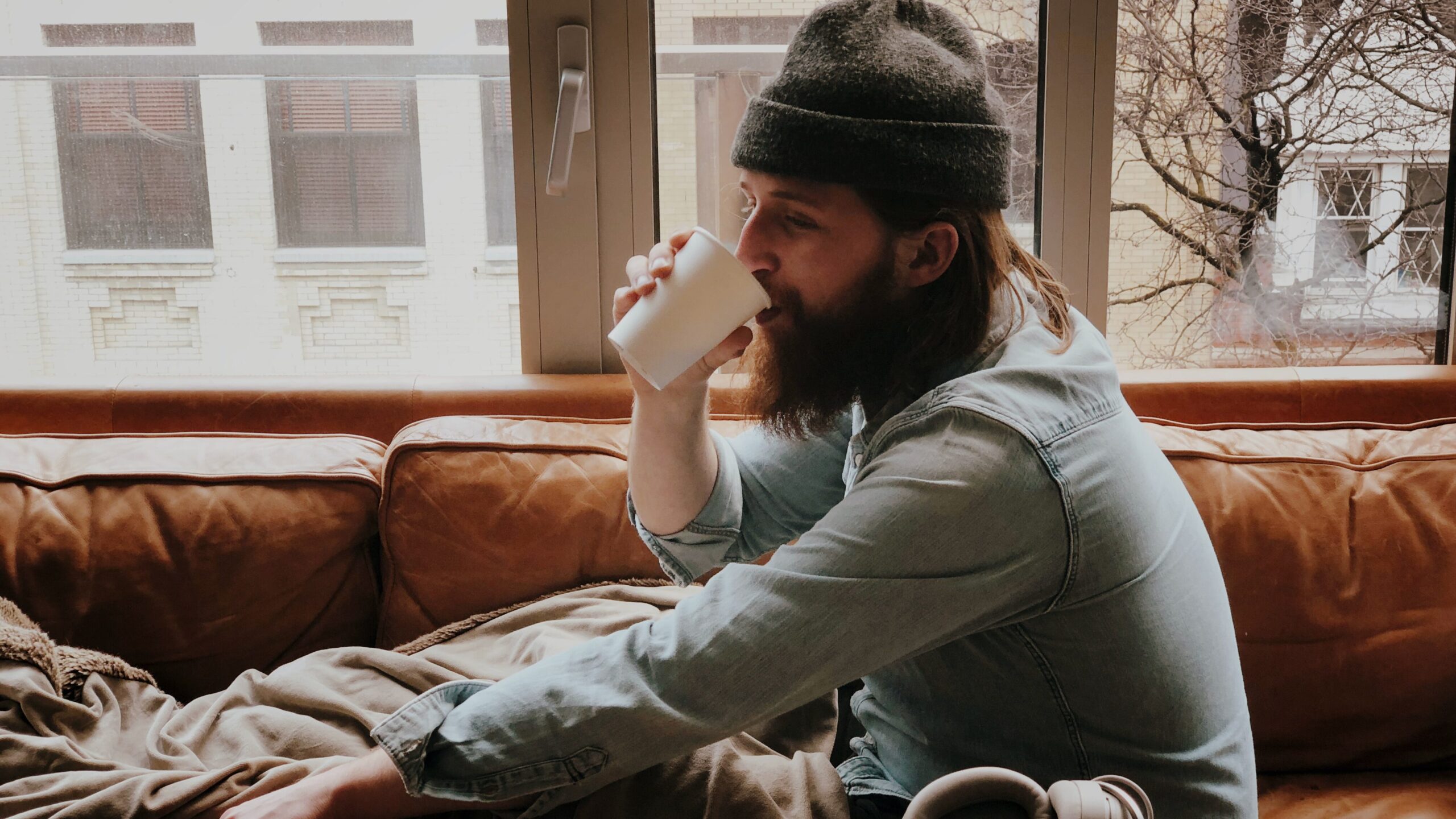 Man drinking a cup of coffee