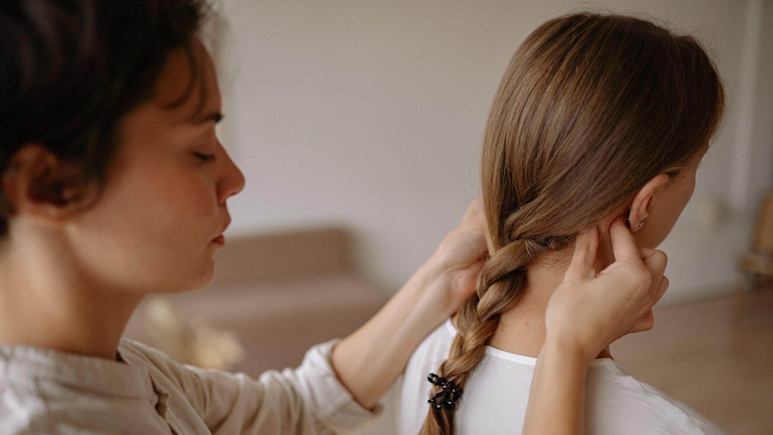 Woman getting a chiropractic neck adjustment for tinnitus relief