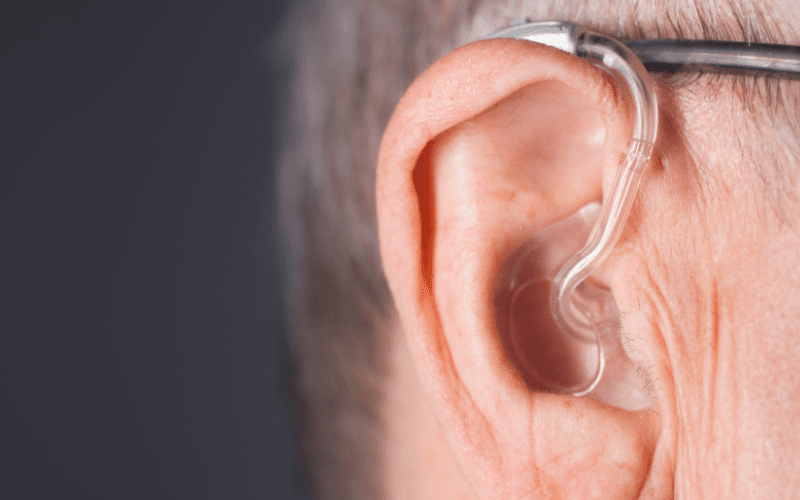 Older person wearing a hearing aid