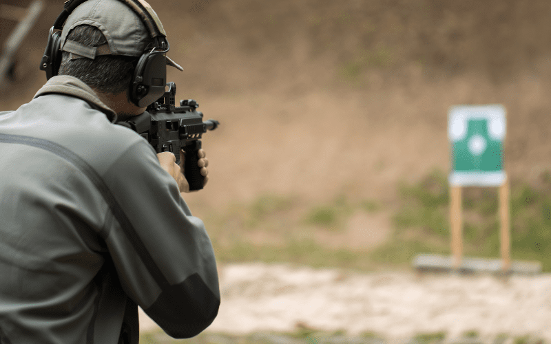 Man shooting at a gun range