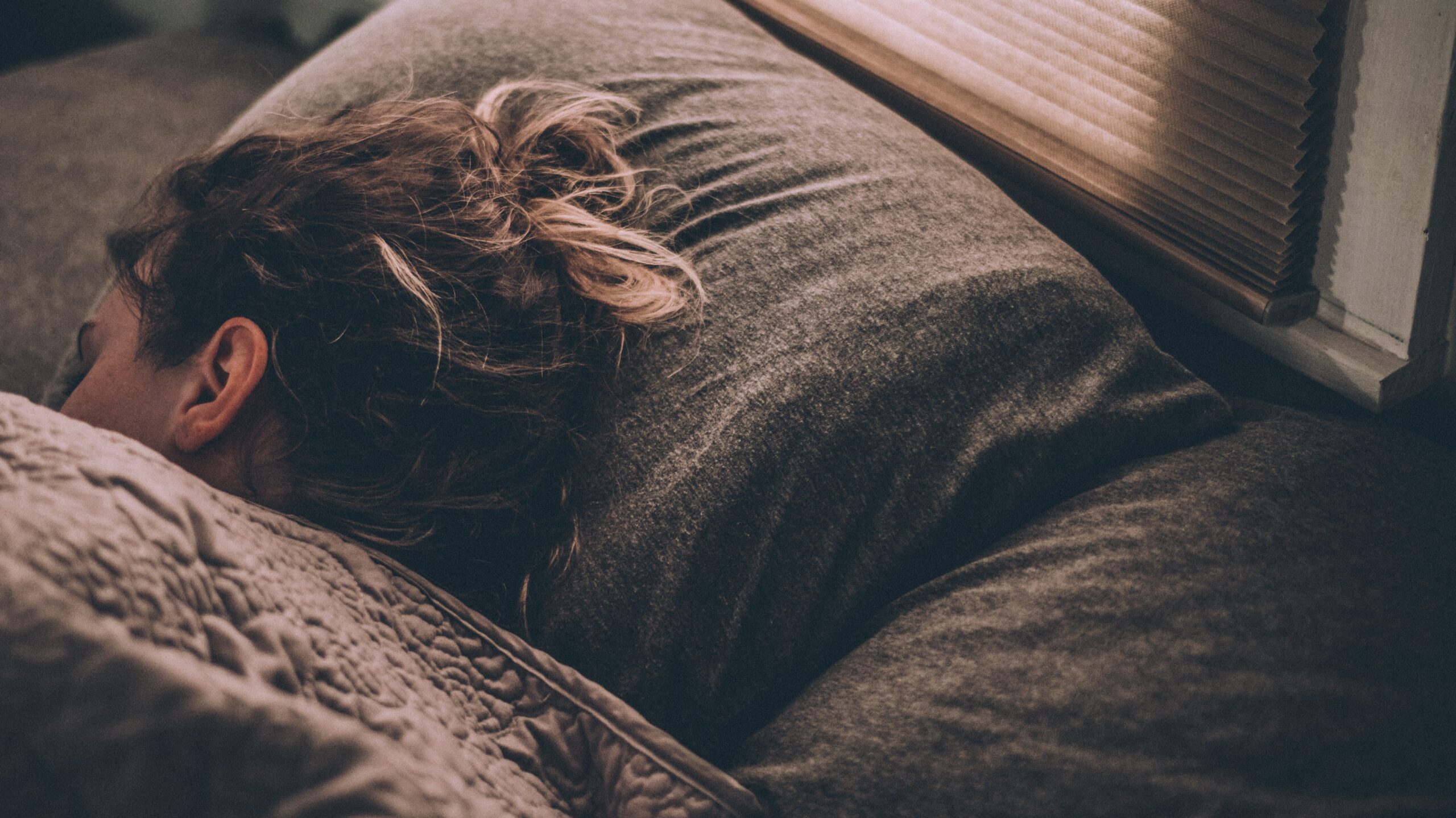 Woman sleeping in bed