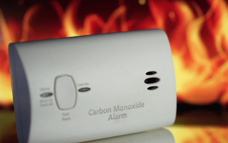 Carbon monoxide detector infront of a fire
