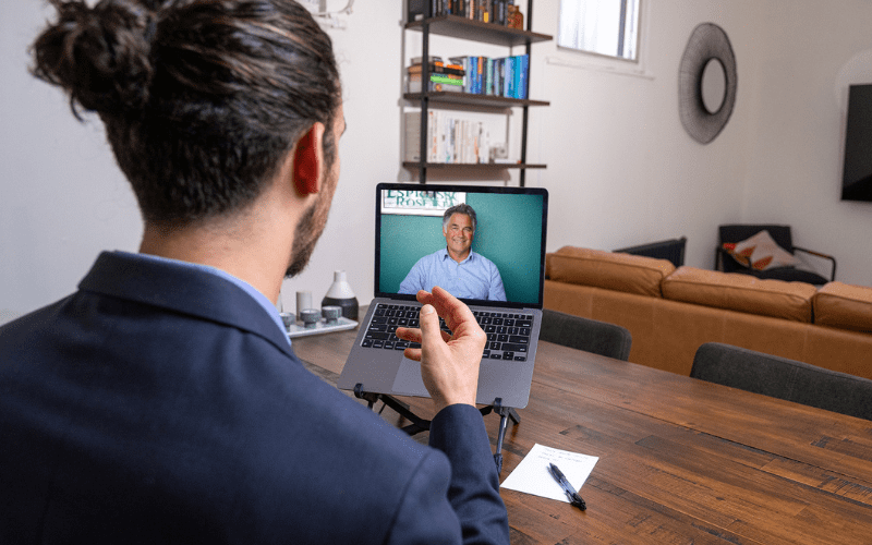 Dr. Ben Thompson working with a tinnitus patient via telehealth