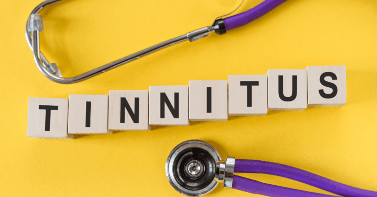 Yellow background with block letters spelling out "tinnitus"