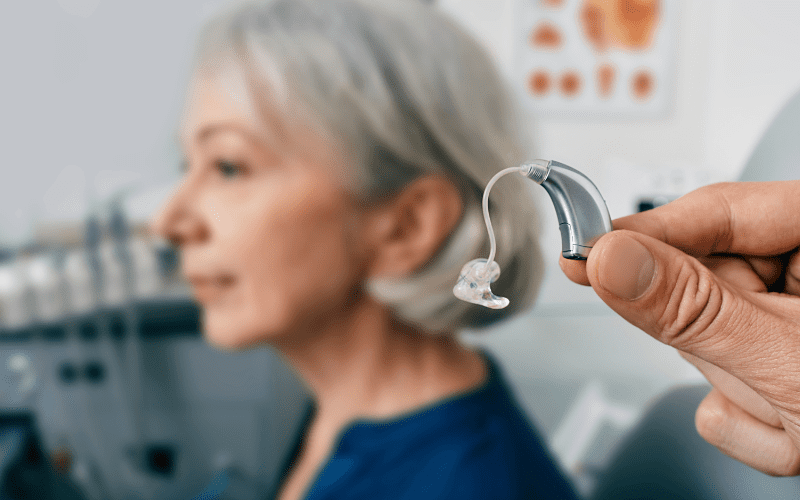 Woman at a hearing aid fitting